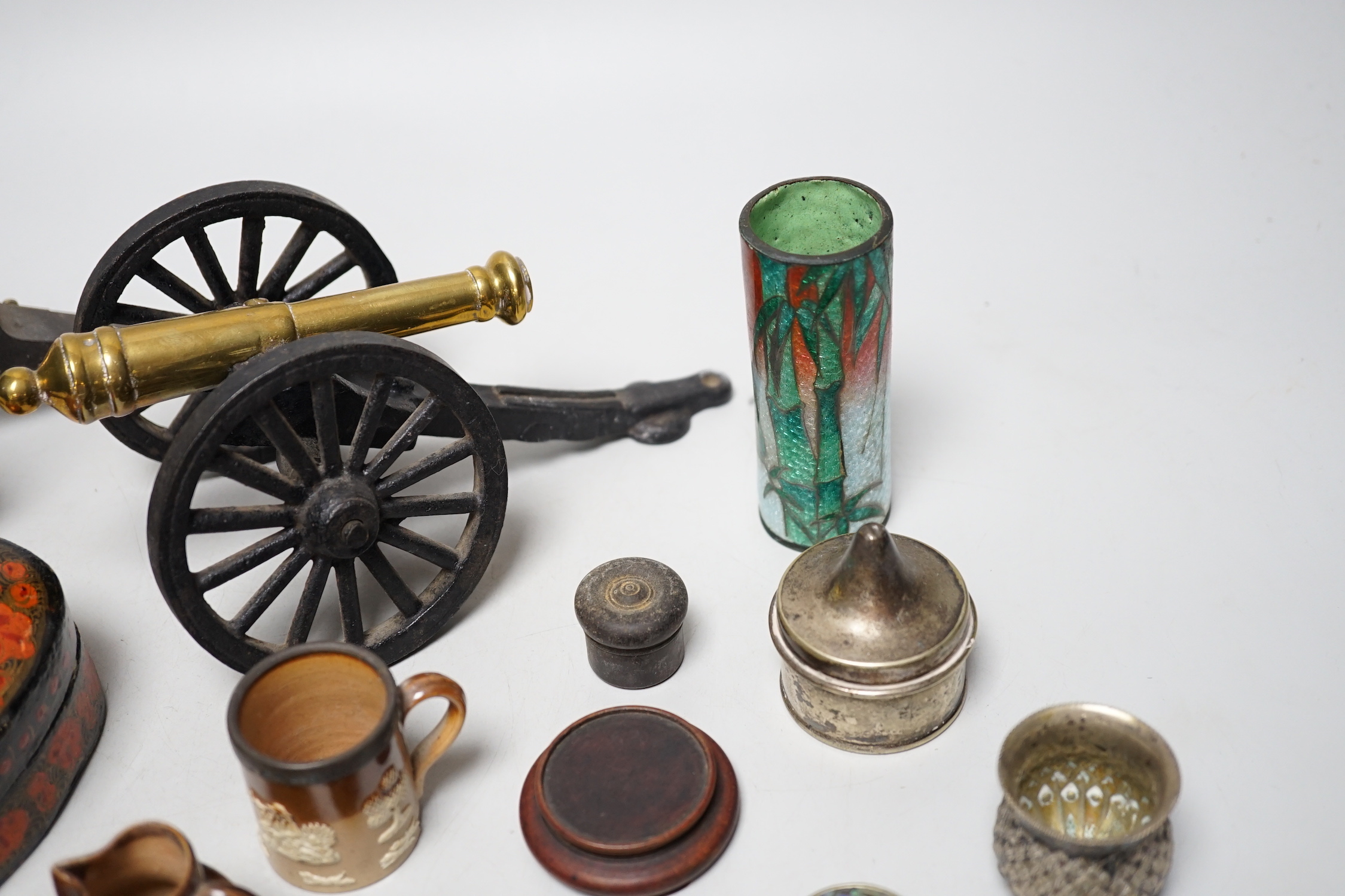 Two metal models of field cannons and sundry small boxes, in treen, white metal and papier-mâché